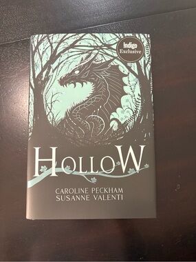 Indigo Hollow Hardcover Book in Mint Green and Dark Gray